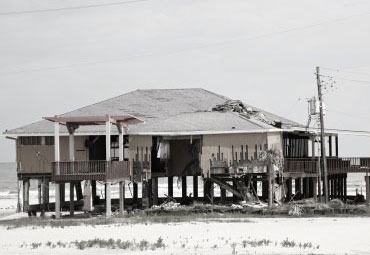 Wind damage - spray foam can help prevent uplift to Waco roofs